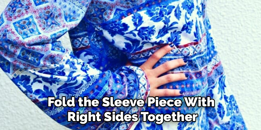 Fold the Sleeve Piece With
Right Sides Together