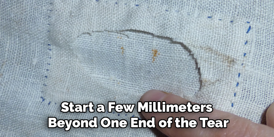 Start a Few Millimeters 
Beyond One End of the Tear