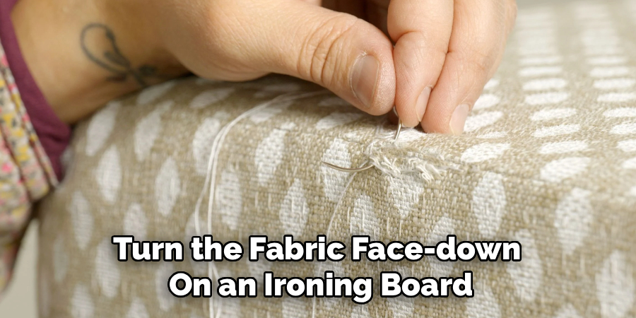 Turn the Fabric Face-down 
On an Ironing Board