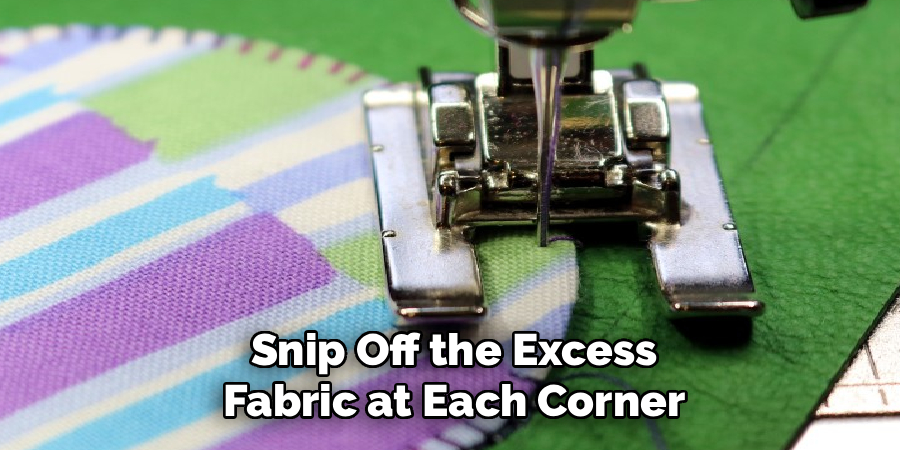 Snip Off the Excess
Fabric at Each Corner